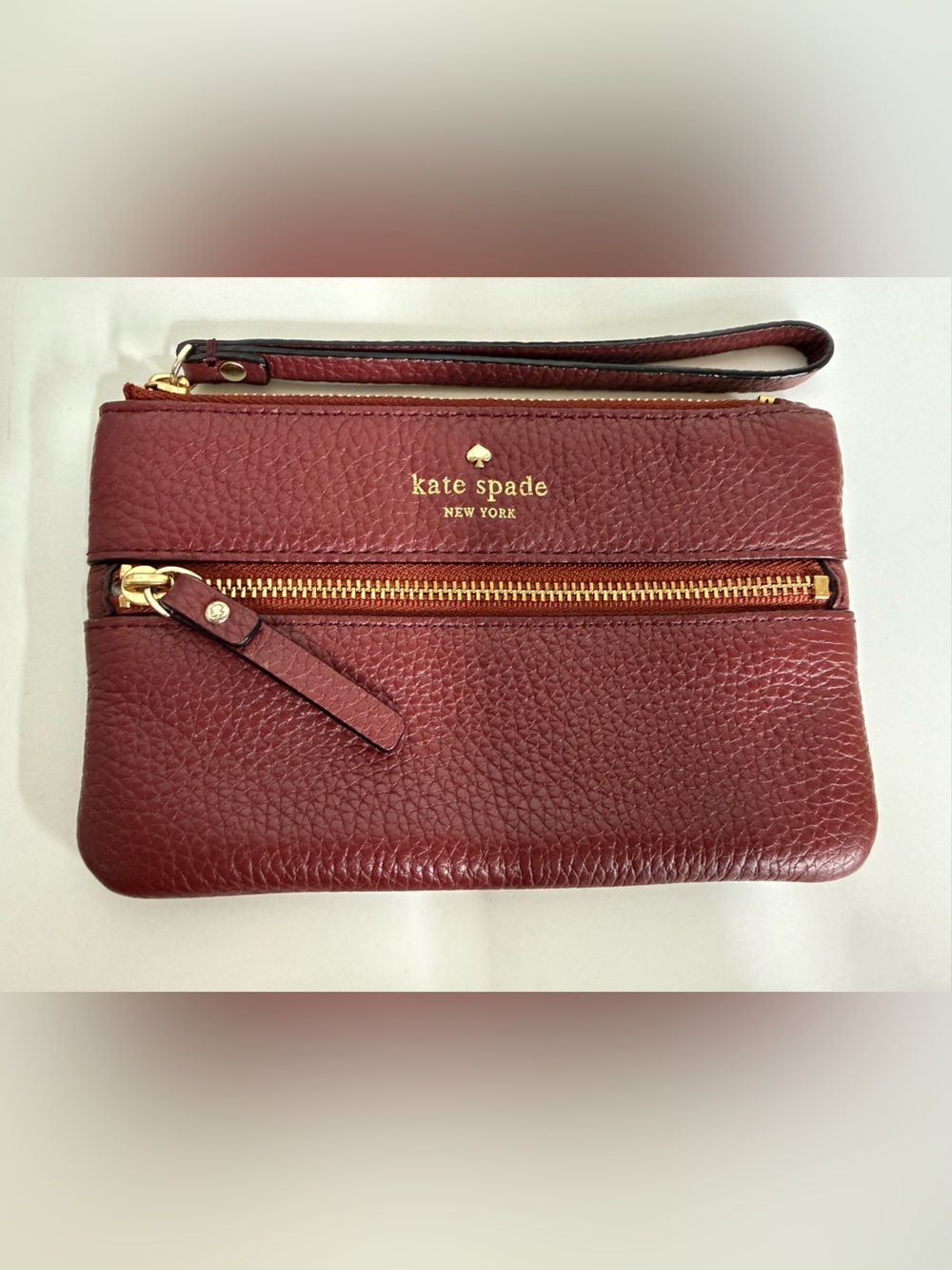 Kate Spade Cobble Hill Bee
Burgundy Red Pebbled Leather
Wristlet